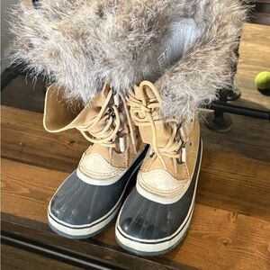 Sorel Tan and Black Winter Boots